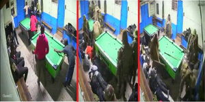 Screengrabs of CCTV footage of police assaulting youth in a pool entertainment joint in Nandi Hills.