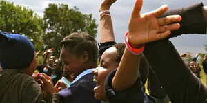 Kenyan students celebrate KCSE results in the past
