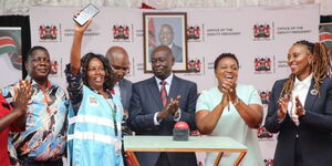 Deputy President Rigathi Gachagu (centre), Health Cabinet Secretary Susan Nakhumicha  (second left) and delegates in Karen on February 16, 2024.