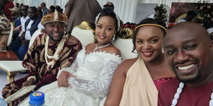 Citizen TV's Stephen Letoo (far left) poses for a photo alongside his wife Irene Letoo (centre) and NTV's Kennedy Mureithi (right) at Ole Ntimama Stadium on April 20, 2024.