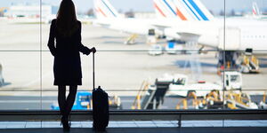 The silhouette of a flight attendant preparing to board a plane in July 2018.