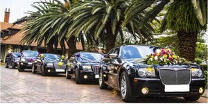 A convoy of vehicles at a wedding