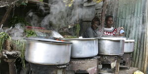 File photo of food being cooked with charcoal
