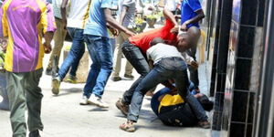 Gang members pictured while committing a crime in Nairobi's Central Business District