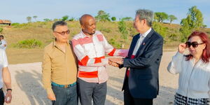 Trade CS Moses Kuria (centre) meets with Chinese investors in Dongo Kundu on April 5, 2023.