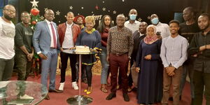 NTV journalists host a send-off for former news anchor Daniel Mule (third from left) inside NTV studios on January 1, 2022.