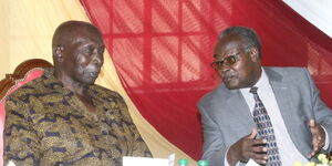 The late former President Daniel Moi (left) with Rev Jones Kaleli on February 25, 2015 at the University.