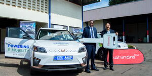 David Mugambi of Kenya Power Receives Two Mahindra XUV400 EVs from Naresh Leekha of Simba Corporation on July 1, 2024