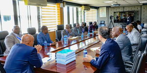 DCI Boss Mohamed Amin during a meeting with officials from the M/S Idemia Southern and Eastern Africa Limited 