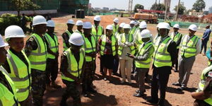 MPs being shown around the site of the medical facility at Kabete by KDF officers during the visit on June 8, 2023.