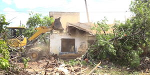 An image of a bulldozer at Uhuru Park in Nairobi CBD (left) and scores of Kenyans strolling at the park