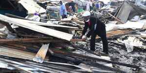 Tom Okode, a mitumba trader at Kongowea market, on Wednesday, April 29, 2020.