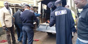 Police officers pictured at a crime scene in Kericho in 2018.