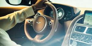  A stock image of a man behind the steering wheel of a car