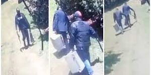 A screenshot of CCTV footage shows two robbers carrying cases loaded with cash on Tuesday, March 1.