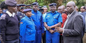Deputy President Rigathi Gachagua speaking to police officer in Kajiado on April 29, 2023.