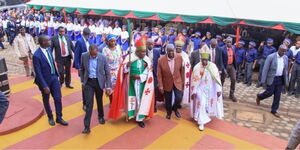 Deputy President Rigathi Gachagua (in brown coat) attends church service in Thika town on May 28, 2023.