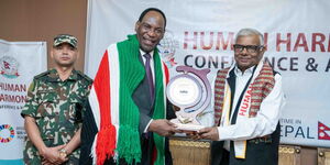 Dr. Ezekiel Mutua receiving the Leadership Award in Kathmandu Nepal on August 19, 2024.