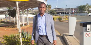 Dr Bundi Karau posing for a photo at the airport on January 2022