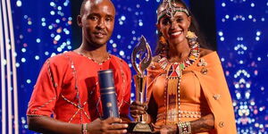 Kenyan nurse Anna Qabale Duba cebebrate after winning the first ever Aster Guardian Global Nursing award with her husband Halkano Hargura.