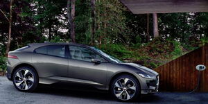 An electric car at a charging point.