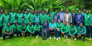 ICT CS Eliud Owalo with Gor Mahia players and officials after a meeting at a Nairobi hotel on Tuesday, April 25, 2023.