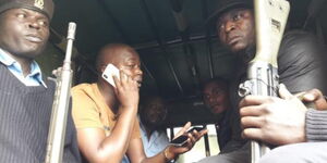 Embakasi Central MP Benjamin Gathiru (centre) after he was arrested on December 18, 2018.