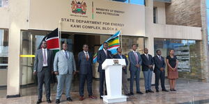 Energy CS Davis Chirchir (centre) addresses a press briefing outside Ministry offices at Kawi Complaex, Nairobi on March 13, 2023.