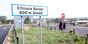 A signpost signalling Kenya-Ethiopia Border.