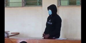 The Busia MCA accused of defilement standing before the magistrate on September 26. 