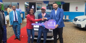 1,500m and 5,000m World Record breaker Faith Kipyegon (left), her father Samuel Kipyegon receive a Toyota Probox from CEO RANA Auto Motors, Sulta Rana on June 17, 2023. 