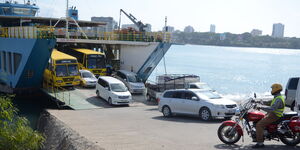 Cars disembarking from a ferry in Likoni, Mombasa