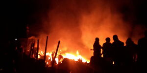 An inferno razing houses in Waruku Estate in Westlands, Nairobi County on Wednesday, October 22, 2025.