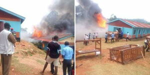 Pupils at Riomego Primary School in Kisii County removing property from a burning dormitory on February 3, 2024 