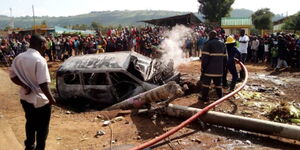 Firefighters at a scene after an accident in Subukia on July 5, 2023