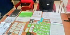 Forged ID cards and simcards recovered by the police.