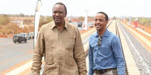 Former President Uhuru Kenyatta (left) and his son Jomo at a Kenya Railways event.