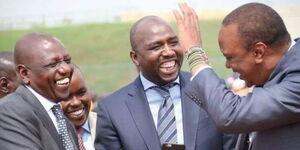From left to right: President William Ruto, Transport CS Kipchumba Murkomen and former President Uhuru Kenyatta.