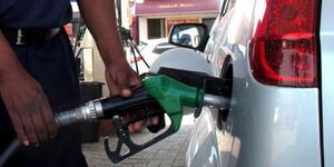 A fuel attendant in Kenya.