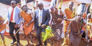 Deputy President Rigathi Gachagua dancing alongside students at the St Benedict Wamutitu Secondary School on May 19, 2023.