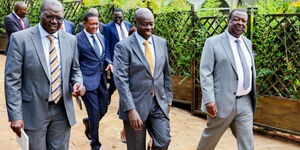 Deputy President with Prime Cabinet Secretary Musalia Mudavadi, among others at his Karen home on December 19, 2023. 