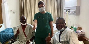 Former Harambee Stars coach Jacob 'Ghost' Mulee and his late brother Mike pose for a photo at an Indian hospital on April 23, 2021