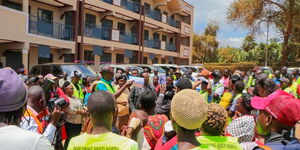 A photo of the MP Gitonga Mukunji and MCA Muriithi Kobole Addressing Embu residents