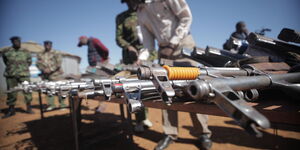Police showcase guns recovered in an operation against bandits in the North Rift Valley region in May 2023