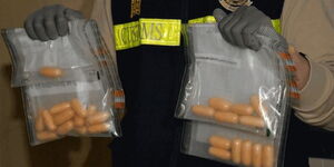 Cocaine pills ejected from a tourist in Hong Kong China.