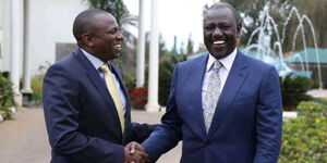 Kikuyu Member of Parliament Kimani Ichung'wah and President William Ruto conversing at an event in Nairobi on March 3 2023.