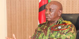 Inspector General of Police Douglas Kanja wearing the AFRIPOL lapel pin during a meeting with members from the Law Society of Kenya at his Jogoo House office, June 4, 2025.