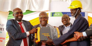 Elgeyo Marakwet Governor Wisley Rotich (left) with officials from KCB Foundation 