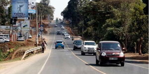 Vehicles moving on the two-lane Kiambu Road 