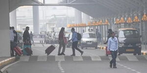 Passengers arriving at the Indira Gandhi International Airport in New Delhi 